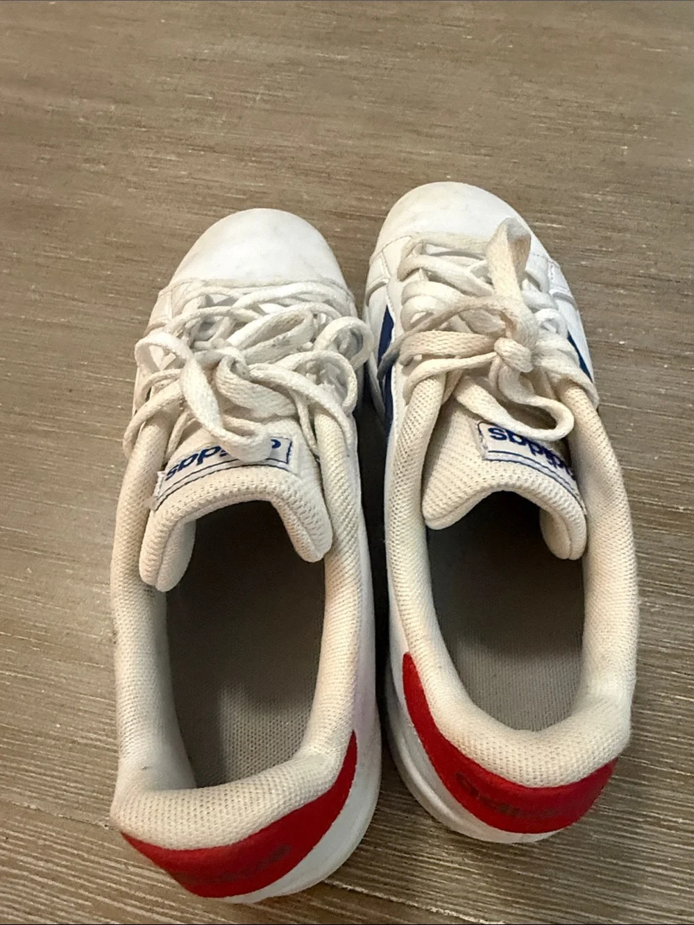 adidas White Sneakers with Blue Stripes and Red Heel Tab